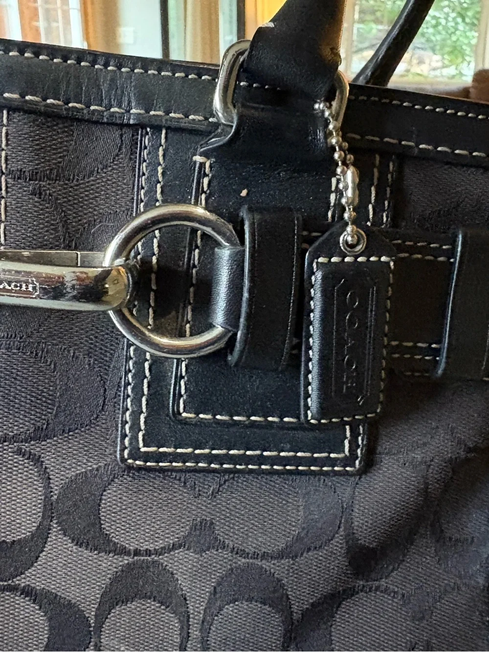 Coach tote featuring